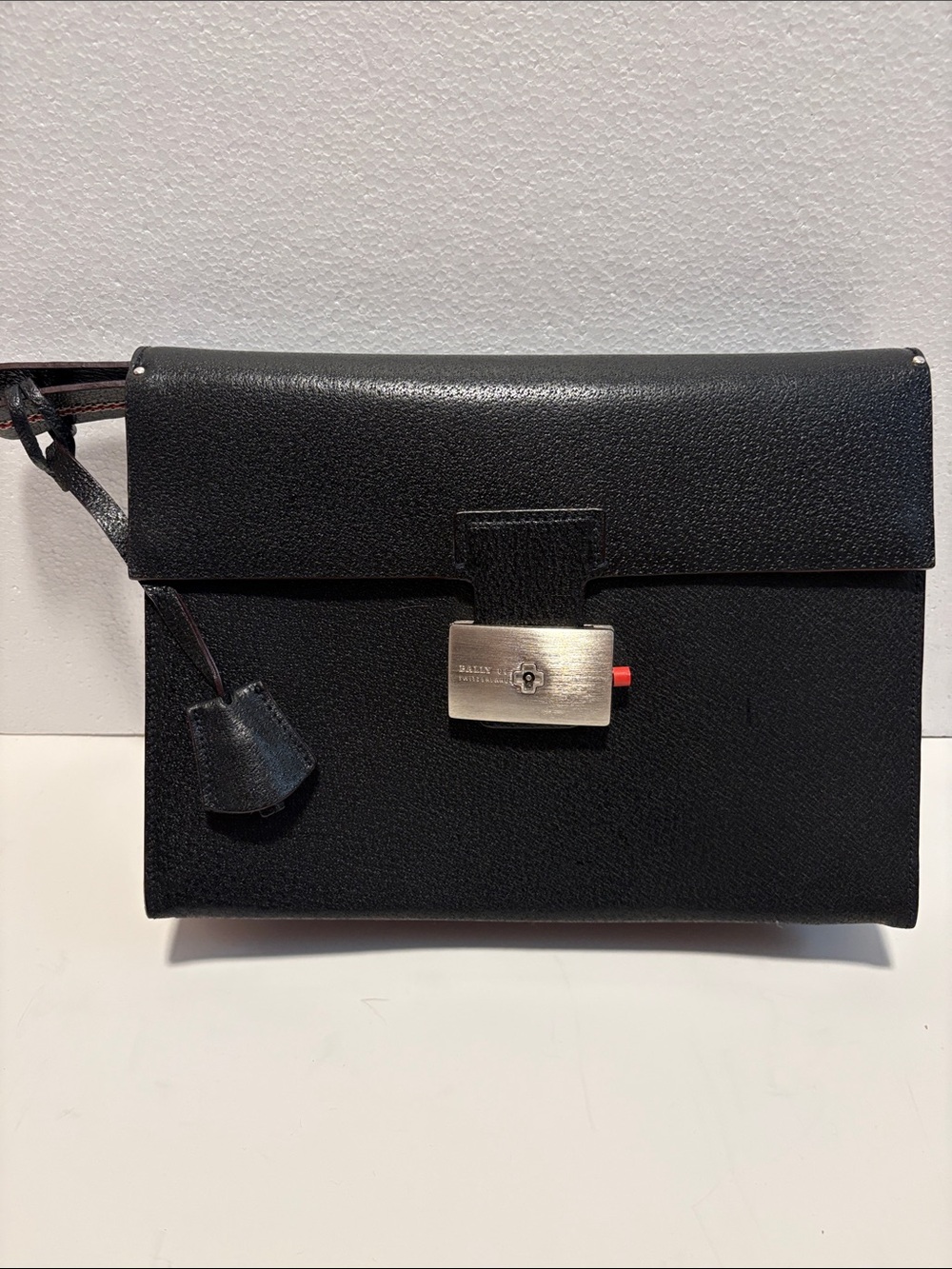 BALLY Vintage black leather clutch with dust cover